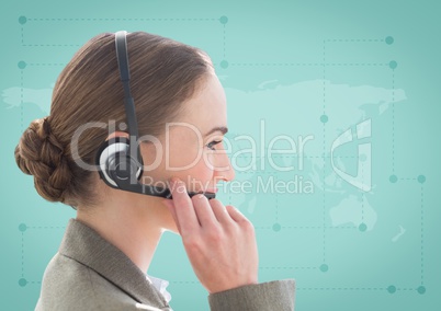 Close up of travel agent with headset against green map