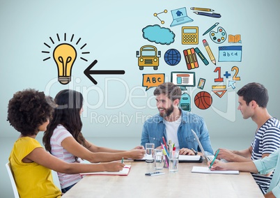 People at desk together with education ideas graphics drawings