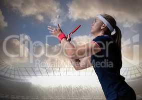 Table tennis player against stadium and sky with clouds