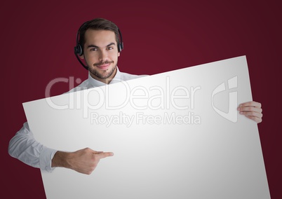 Customer service man with large blank card against maroon background