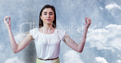 Woman Meditating peaceful by cloud wall