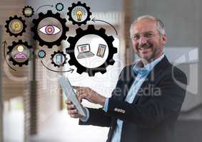 Business man with tablet and black gear graphics