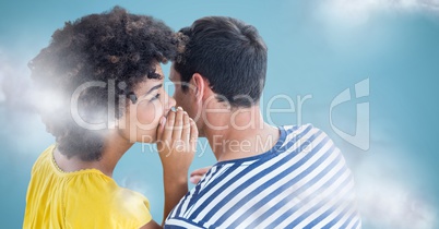 Couple whispering against blue background with clouds