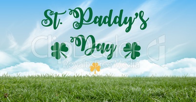Patrick's Day graphic with yellow shamrock against sky and grass