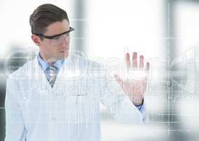 Man in lab coat and goggles with white graph and flare against blurry room