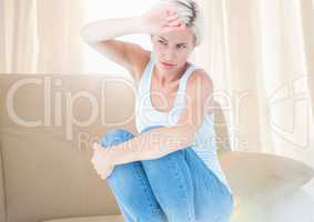 Sad  distressed afraid woman crouched near window light