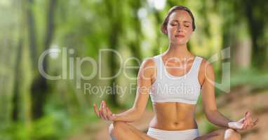 Woman Meditating in forest