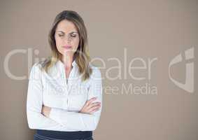 Upset stressed businesswoman against brown background