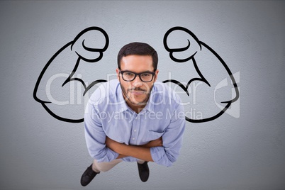 Aerial view of confident business man  against grey background with drawing of  flexing muscles