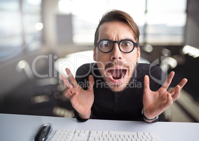 Stressed man hysterical in office