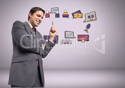 Businessman with business graphic drawings