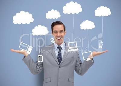 Man deciding or choosing computers phones and tablet devices hanging from clouds with open palms han