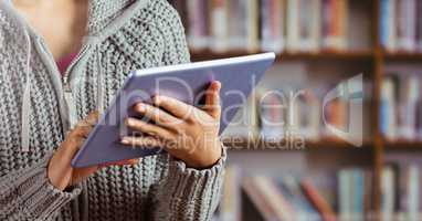 Woman on tablet in Library
