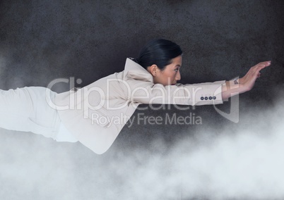 Business Superhero against stone wall with clouds
