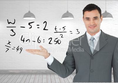 Man with open palm hand under math equations