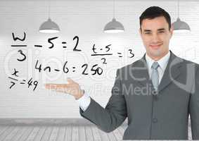 Man with open palm hand under math equations