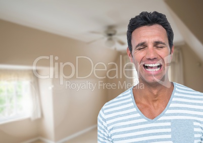 Man frustrated crying against room