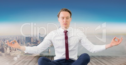 Man Meditating peaceful over city