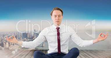 Man Meditating peaceful over city