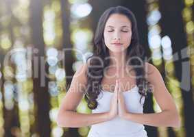 Woman Praying Meditating yoga peaceful in forest