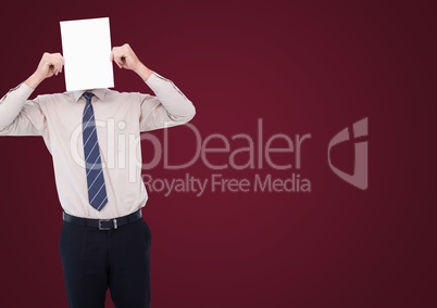 Business man with blank card over face against maroon background