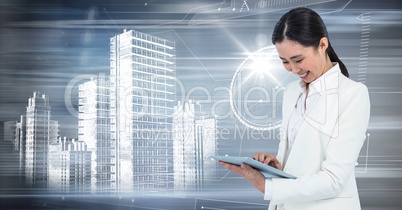 Woman with tablet and white building graphic against motion blur