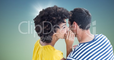 Couple whispering against blue green background