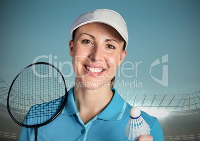Badminton player against blue sky and stadium