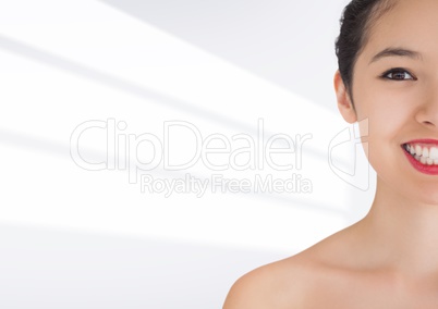 Half of woman smiling against white background