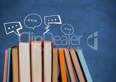 Standing books with white speech bubbles against blue chalkboard