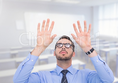 Man with open palm hands in classroom