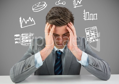 Businessman stressed with figures and charts drawings graphics