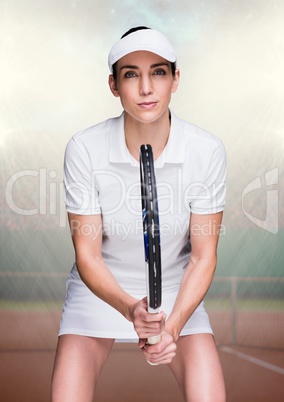 Tennis player on court with bright lights