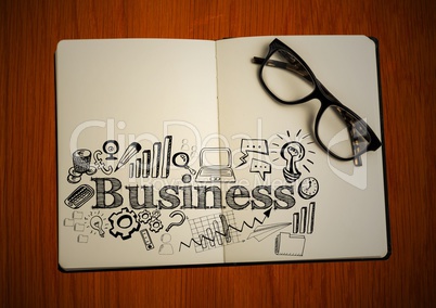 Open book with glasses and black business doodles on table