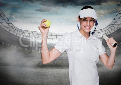 Tennis player against stadium with bright lights and sky with clouds