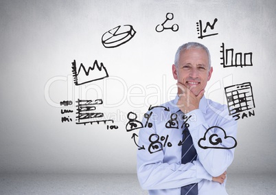 Businessman with business graphics drawings