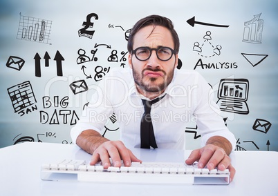 Man at desk against black business doodles and blurry grey wood panel