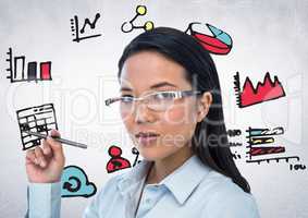 Woman with pen and pink blue yellow business doodles against white wall