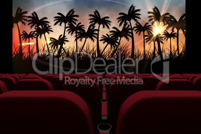 3d composition of cinema seats facing sunset view with palms