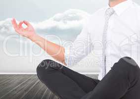 Man Meditating peaceful by clouds