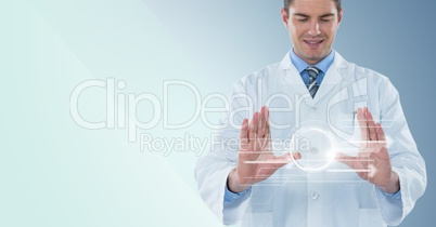 Man in lab coat with white interface and flare between hands against blue background