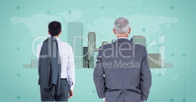 Businessmen looking at City with world map