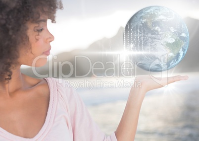 Woman with open palm hand holding world earth globe interface