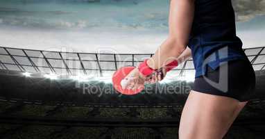 Table tennis player lower body against stadium  with bright lights