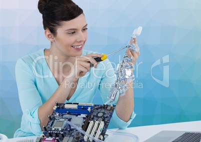 Woman with electronics against blue vector mesh