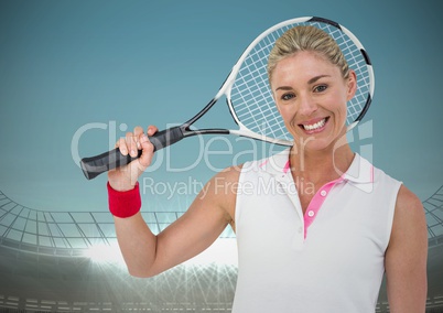Tennis player smiling against stadium with blue sky and bright lights