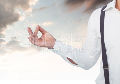 Man Meditating with clouds
