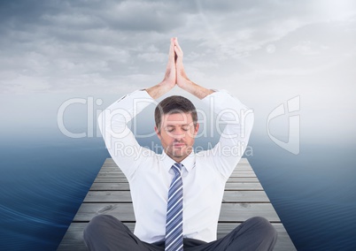 Man Meditating by sea