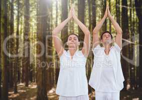 People Meditating yoga in forest