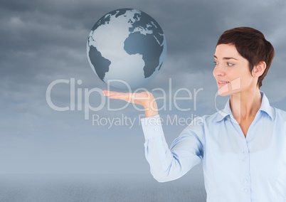 Woman with open palm hand under world earth globe